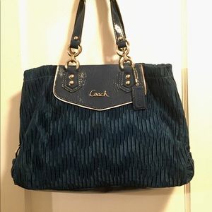 Coach bag in teal satin and patent leather.
